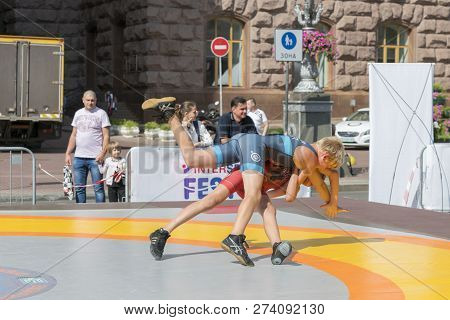 Ukraine, Kiev, Ukraine 09.09.2018 Indicative Street Performance Wrestlers. Promotion Of Healthy Life