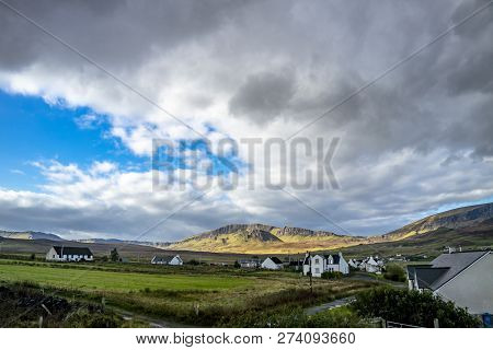 Autumn Countryside Landscape Of The Staffin Area With The Quiraing In Background - Isle Of Skye, Sco
