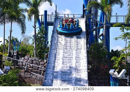 Orlando, Florida. October 19, 2018. Friends Enjoy Impressive Descent In Infinity Falls At Seaworld M