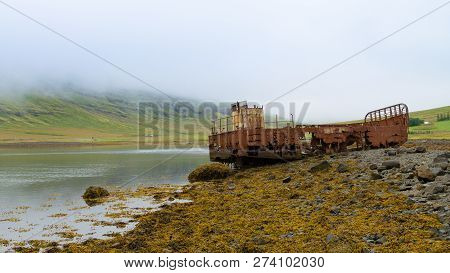Shipwreck From Mjoifjordur Fiord, East Iceland.  Icelandic View