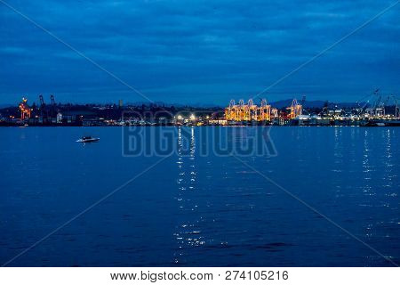 A View Of The Port Of Seattle Ligthts At Night.