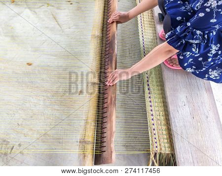 The Hands Of Women Woven Mats Traditional Are Products Handmade In Countryside Of Thailand.
