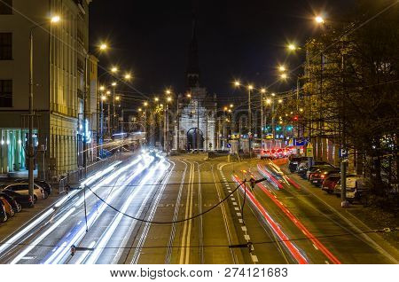 Szczecin, West Pomeranian / Poland - 2018: Evening Traffic On Wyszynski St. In Front Of Brama Portow