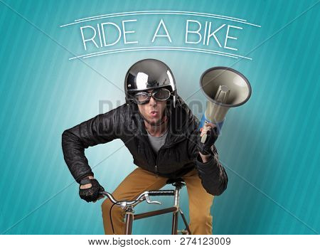 Kooky young guy on a bike with cyclist keywording and streaky background