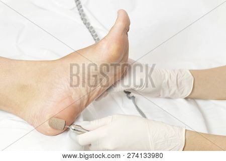 Process Of Pedicure At Beauty Salon Close Up