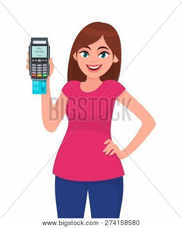 Young Woman Showing/holding Pos Payment Terminal Or Credit/debit Cards Swiping Machine While Holding