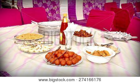 Different Meals For The Guests On The Wedding Table