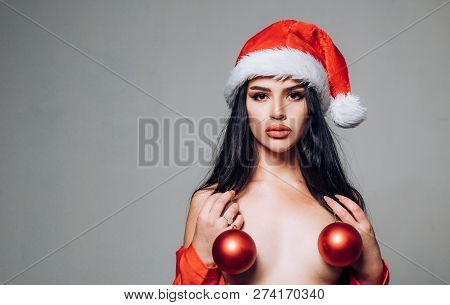 Red Christmas Balls With Boobs. Sexy Boobs And New Year Party. Topless Santa Woman. Erotic Lingerie 