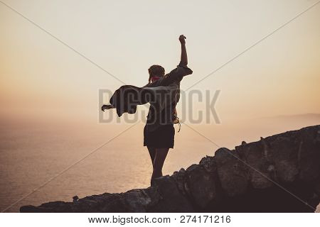 Woman Balancing On Stones In Monolithos Castle In Rhodes, Greece
