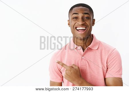 Portrait Of Impressed Delighted And Surprised Charismatic Handsome African American Young Male In Pi