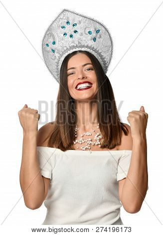 Happy Successful Young Woman Un Russian Traditional Cap Kokoshnik With Raised Hands Shouting And Cel