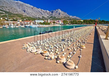 Baska Voda Waterfront Breakwater And Fishing Nets View, Makarska Riviera In Dalmatia, Croatia