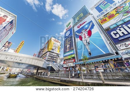 Osaka, Japan - April 14, 2016 : The Glico Man Advertising Billboard And Other Advertisemant In Donto