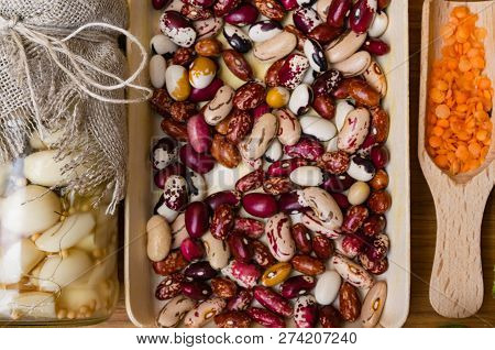 Collection Of Various Beans , Lentils, And Garlic Marinated With Koriander, Health Food Rich With Mi