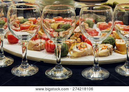 Empty Glasses With Mixed Vegetables On The Plate Background