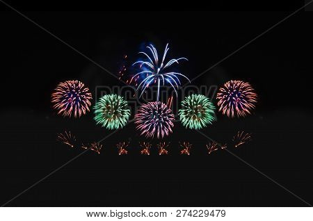 Colorful Fireworks Abstract Background In The Dark Sky With Copy Spacce For Festival Celebration Hol