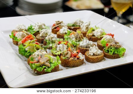 Small Sandwiches On The White Plate, Black Surface