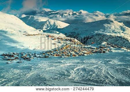 Amazing Winter Landscape, Famous Ski Resort With Snowy Buildings And Snowy Houses In French Alps, Al