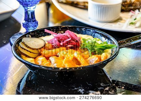 Skoblyanka On Stroganovski From Fish With Potatoes On A Frying Pan