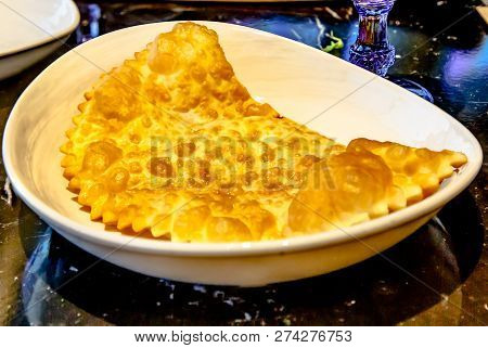 Traditional Tatar Dish, Chebureki. Puff Pastry Pie With Meat Filling.