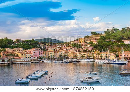 Panoramic View Over The Famous Town Porto Azzurro At Sunset, In Elba Island, Italy
