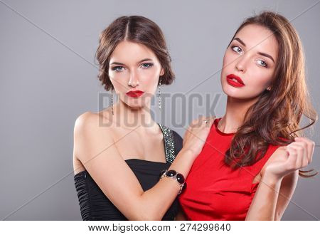 Two young beauty women standing together . Two young beauty wome