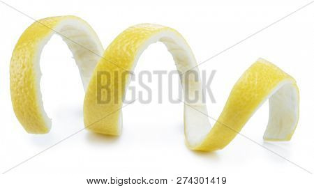 Lemon peel or lemon twist on white background. Close-up.