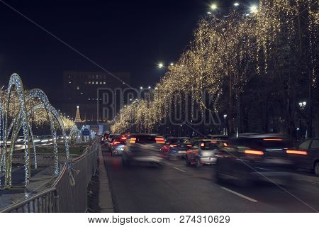13 Dec 2018, Romania, Bucharest. Bulevardul Unirii Christmas Lights And Traffic In Front Of The Parl
