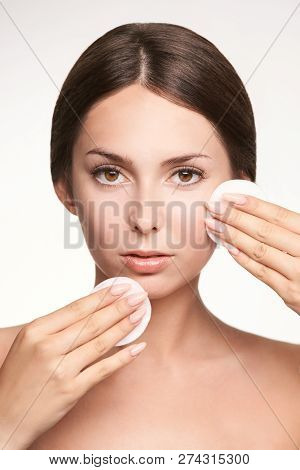 Home Face Care. Girl Remove Makeup. Woman Hand With Pad. Skin Clean With Cotton.