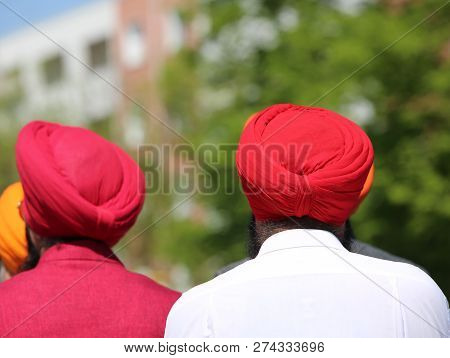 Religious Sikh Procession With Two Men With Big Turbans