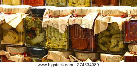 Glass Jars With Spicy Specialties Typical Of Southern Italian Regions Suche As Green Broccoli Tomato