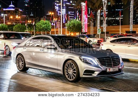 Dubai, Uae - November 18, 2018: Luxury Motor Car Mercedes-benz W222 S-class In The Night City Street