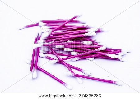 Pink Colored Cotton Coated Ear Buds Or Q-tips Isolated On White.