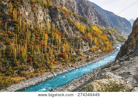 Gilgit Baltistan In Autumn Show Colorful Scenery With Hunza River Flows Along The Karakoram Highway.