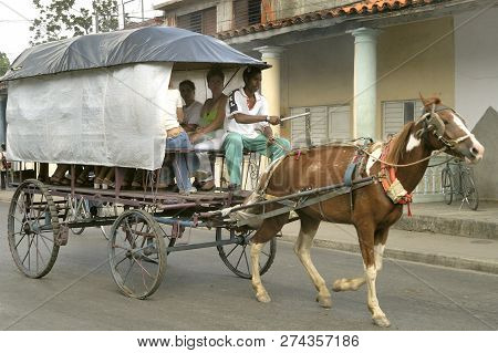 Granma, Cuba-april 04, 2016: Public Transport By Horse And Carriage In Street, Granma, Cuba