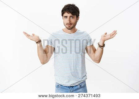 Boyfriend Making Shoulder Shrug During Argument Cannot Get Clue Spread Raised Hands Sideways Looking