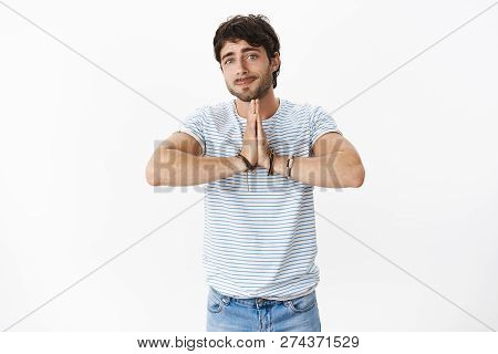Please Help Me Out. Portrait Of Charming And Sincere Guy With Beatiful Blue Eyes And Bristle Showing