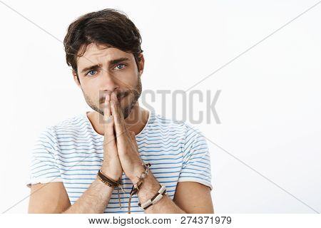 Reckless Uneasy Having Guy Having Tough Time Asking Friend Help Holding Hands In Pray Begging For Fa