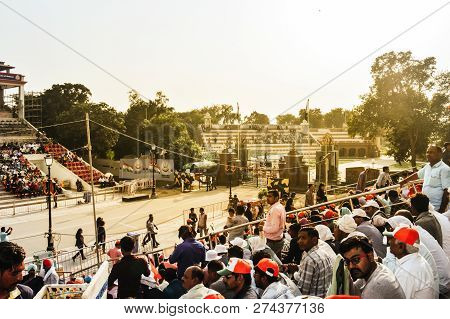Wagha Border, Amritsar, Punjab, India - June, 2017. People Enjoying The Lowering Of Flags Ceremony. 