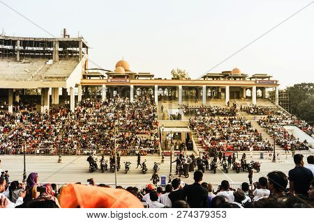 Wagha Border, Amritsar, Punjab, India - June, 2017. People Watching The Lowering Of Flags Ceremony. 