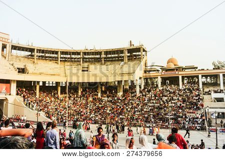 Wagha Border, Amritsar, Punjab, India - June, 2017. People Watching The Lowering Of Flags Ceremony. 