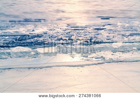 First Ice On The Lake In Late Autumn. Winter Coming Landscape