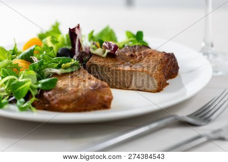 Boston Pork Butt With Fresh Salad Close Up