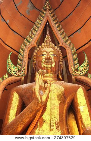 Golden Buddha statue at Tiger Cave Temple (Wat Tham Suea), Kanchanaburi province, Thailand