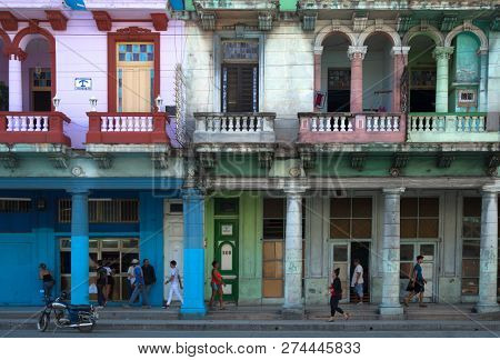 HAVANA-CUBA- DEC 5, 2018:  Neoclassical architecture with column in blue, red, lilac and green in Vedado Havana in Cuba