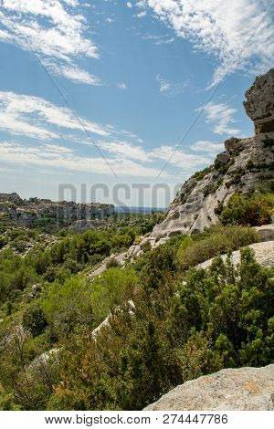 Vacation Tourist Destination In France, Alpilles Mountains Gorge In Provence, Green Pine Forests And