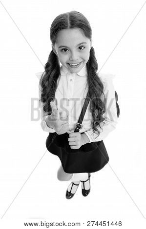 Highly Recommend. Schoolgirl Shows Thumb Up Gesture, Isolated White Background. Girl Happy Smiling R