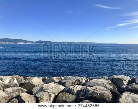 View From The Pier With Boats At The Distance In Sanxenxo Galicia Spain