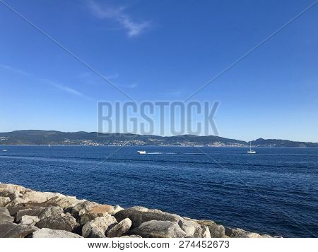 View From The Pier With Boats At The Distance In Sanxenxo Galicia Spain