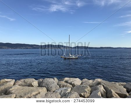 View From The Pier With Boats At The Distance In Sanxenxo Galicia Spain